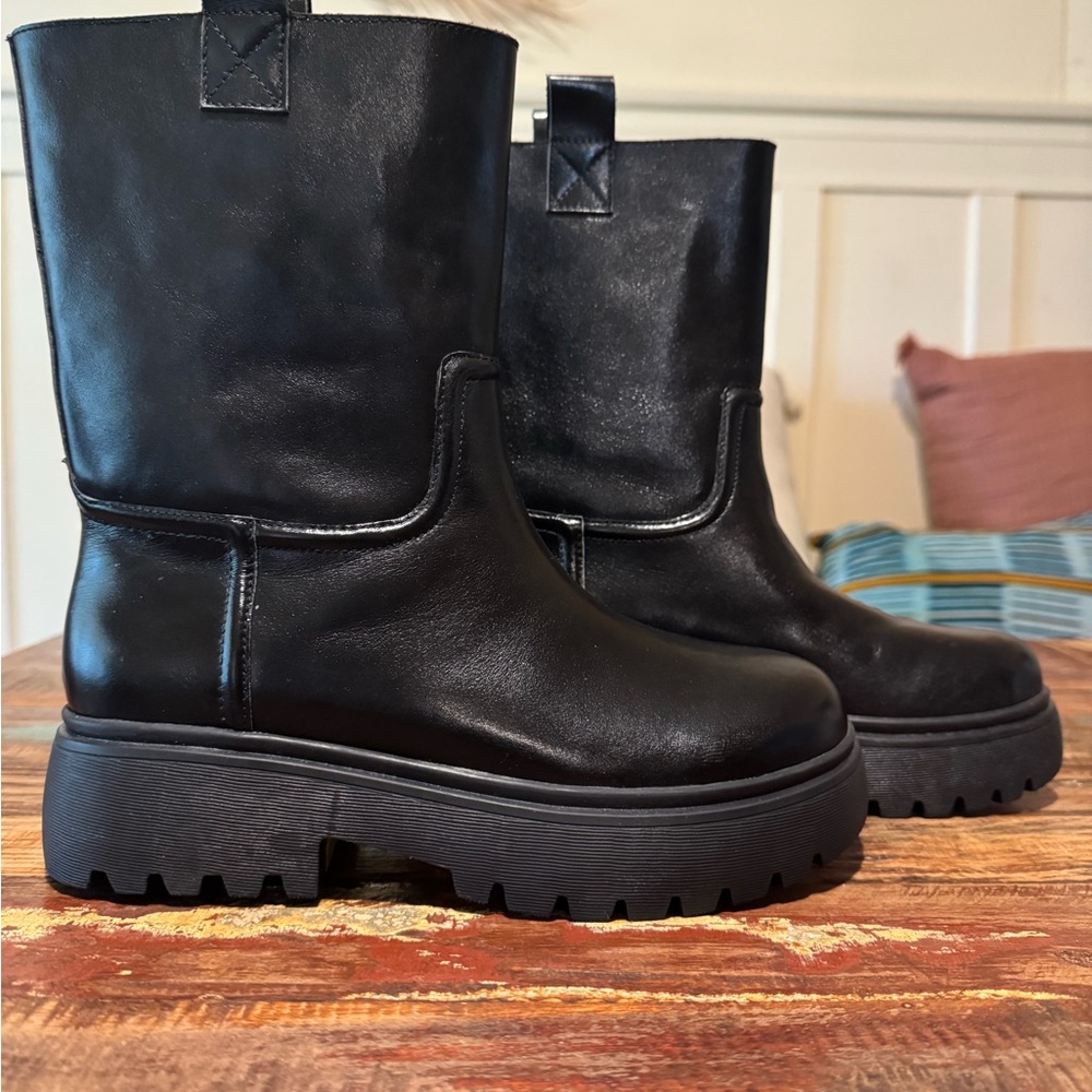 INTENTIONALLY BLANK sleek black utility boots